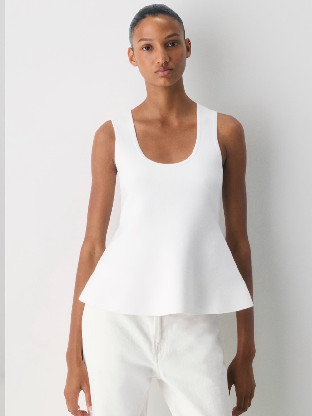Aritzia Babaton Womenโs White Tenacity Peplum Top - Wonder Yarn Sz XS